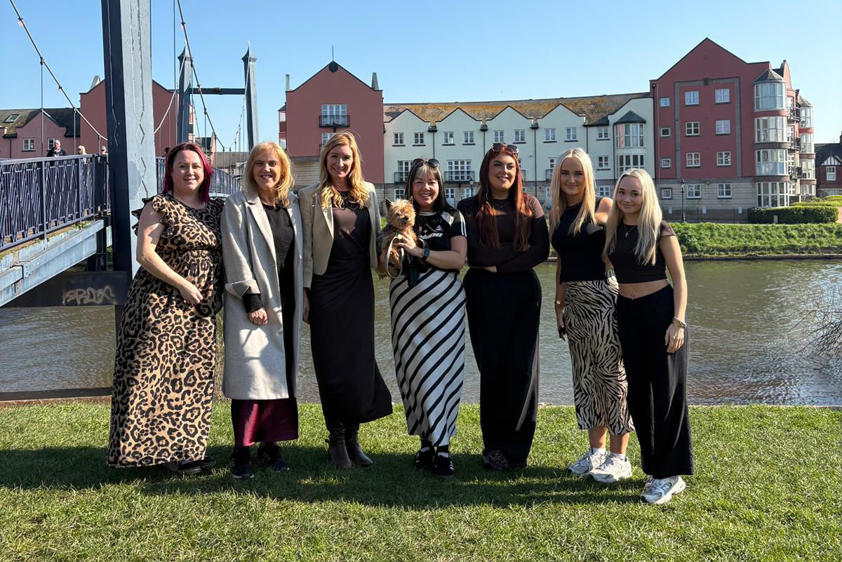 The Viva Hair 134 team together by the Exeter quay