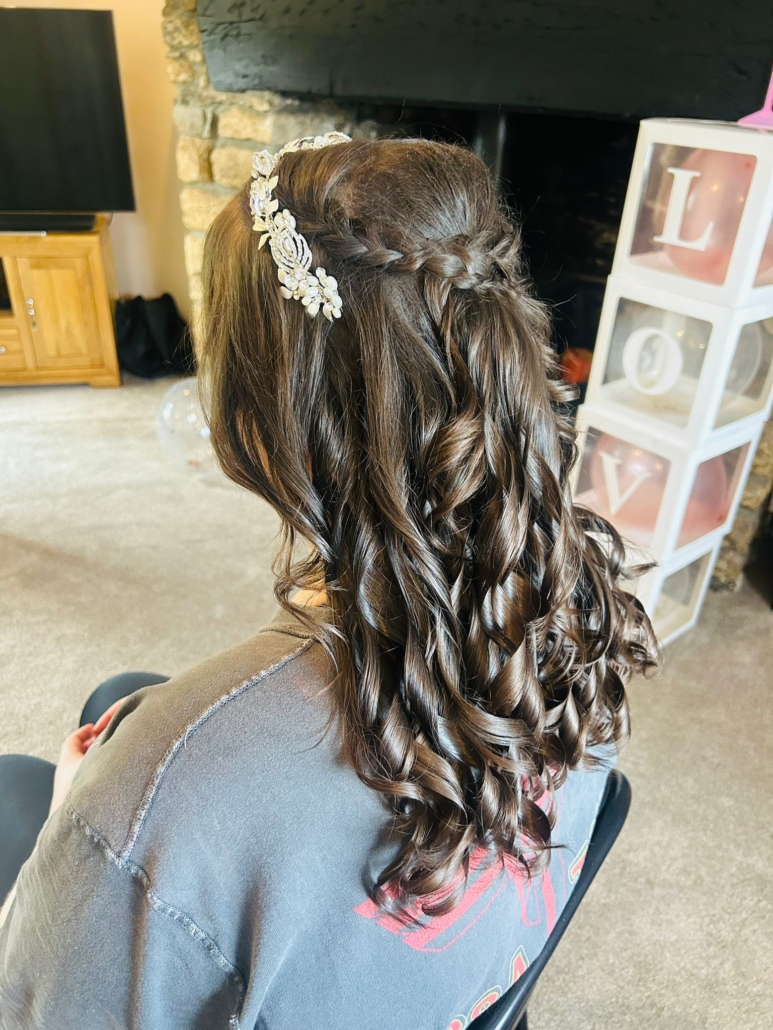 Bridal half-up with floral piece