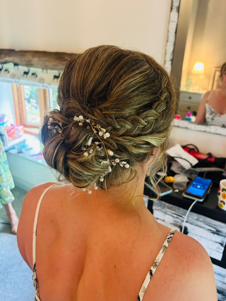 Intricate pearl-detailed updo